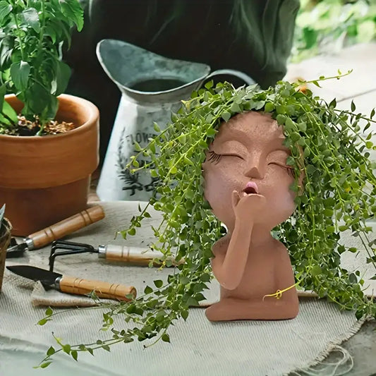 Whimsical Flower Blowing Kiss Planter